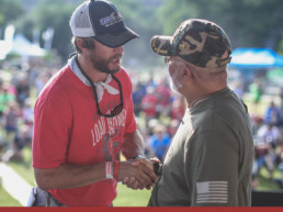 image of two people shaking hands